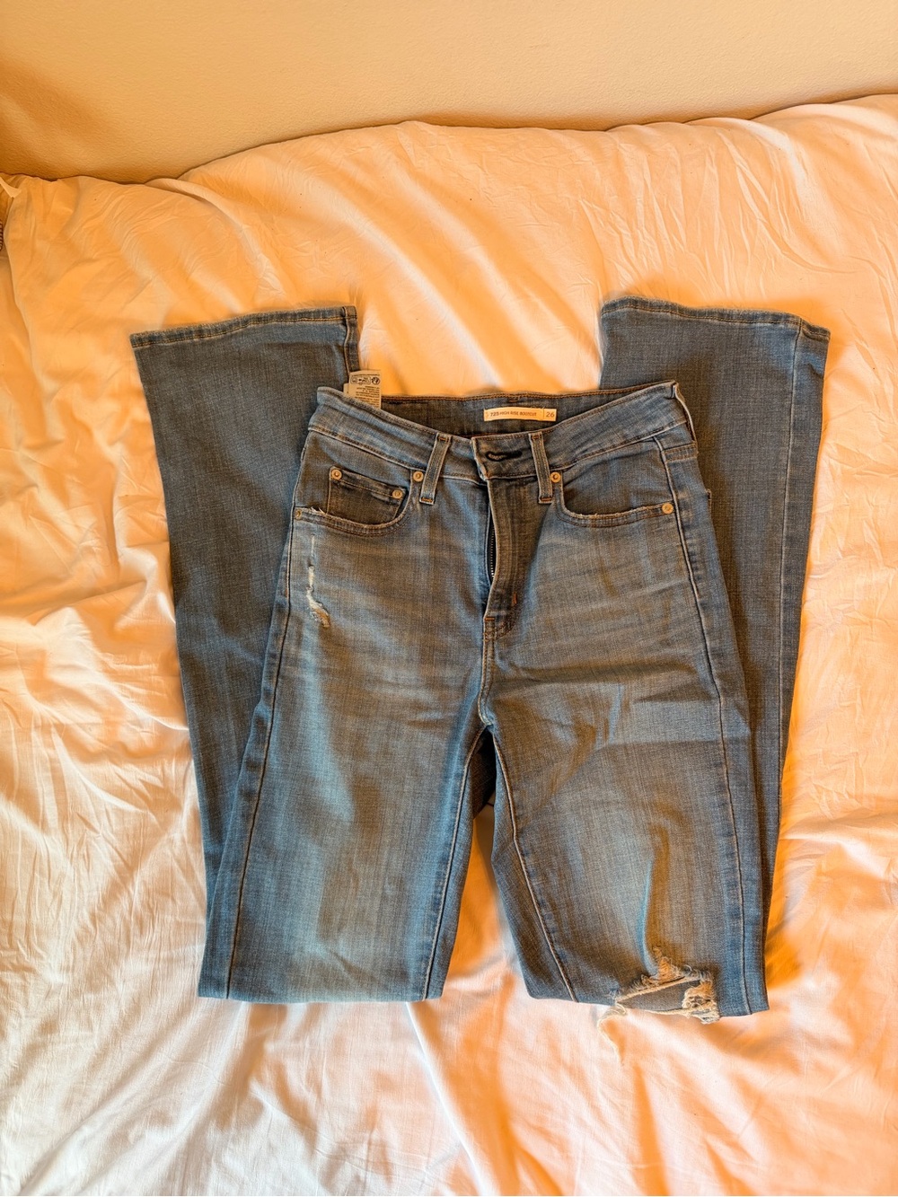 Levi’s Women's Blue high rise Distressed Bootcut Jeans